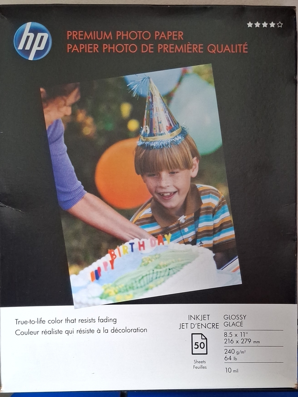 HP Premium Photo Paper Pack — Black and White Packaging with Colorful Print
